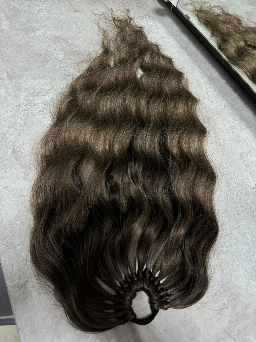 Хвост на резинке волна