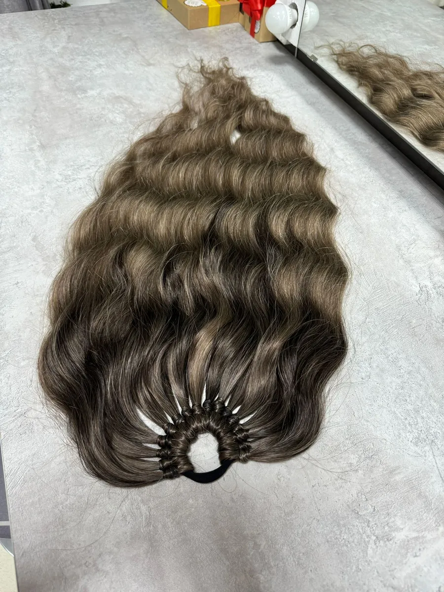 Хвост на резинке волна