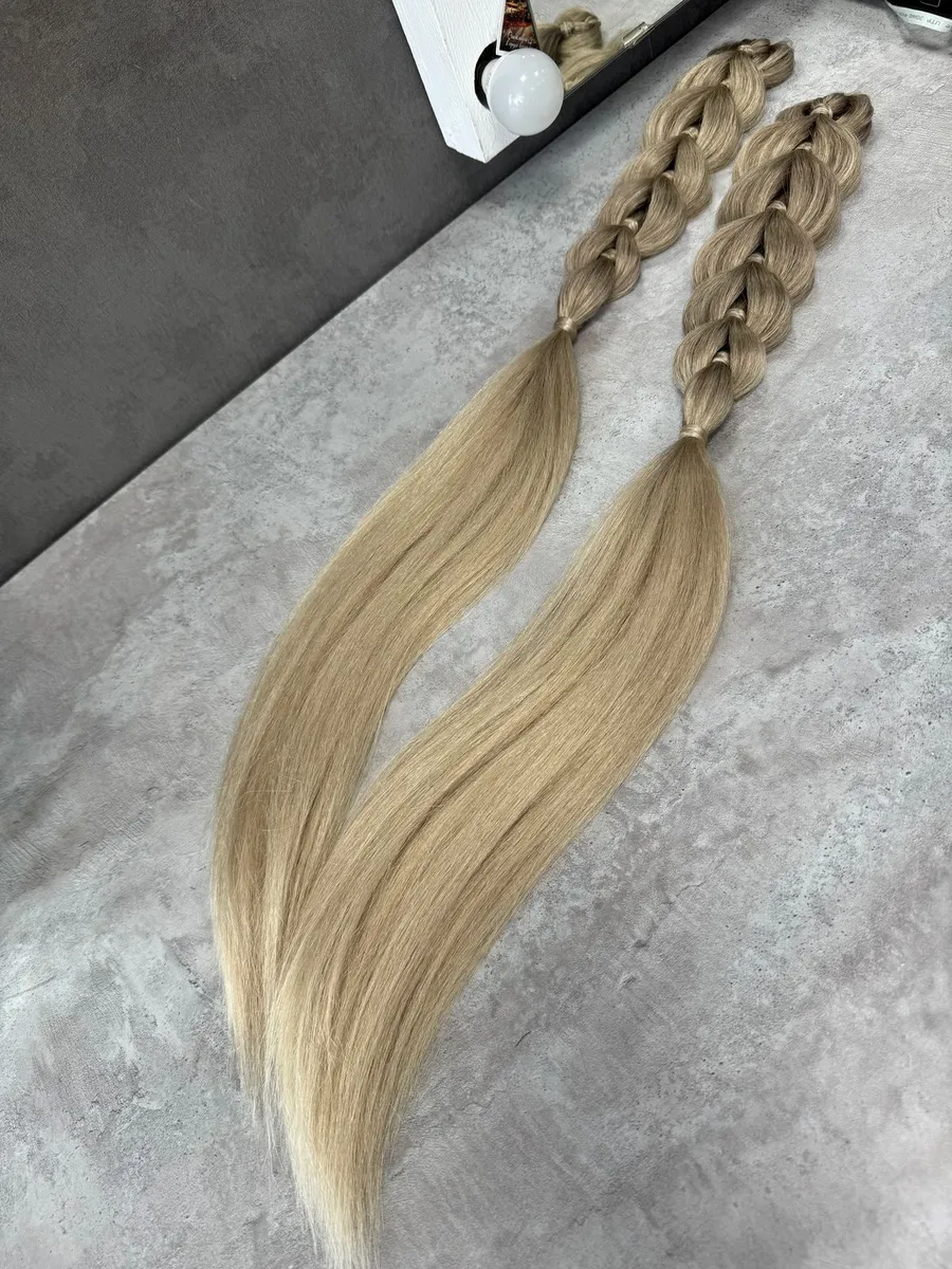 Французские косы с хвостами на заколках