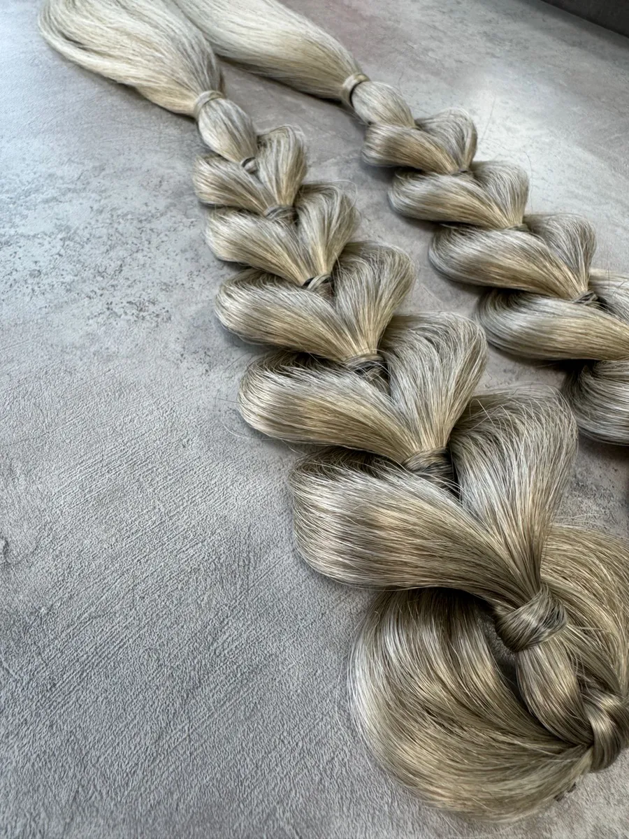 Французские косы с хвостами на заколках