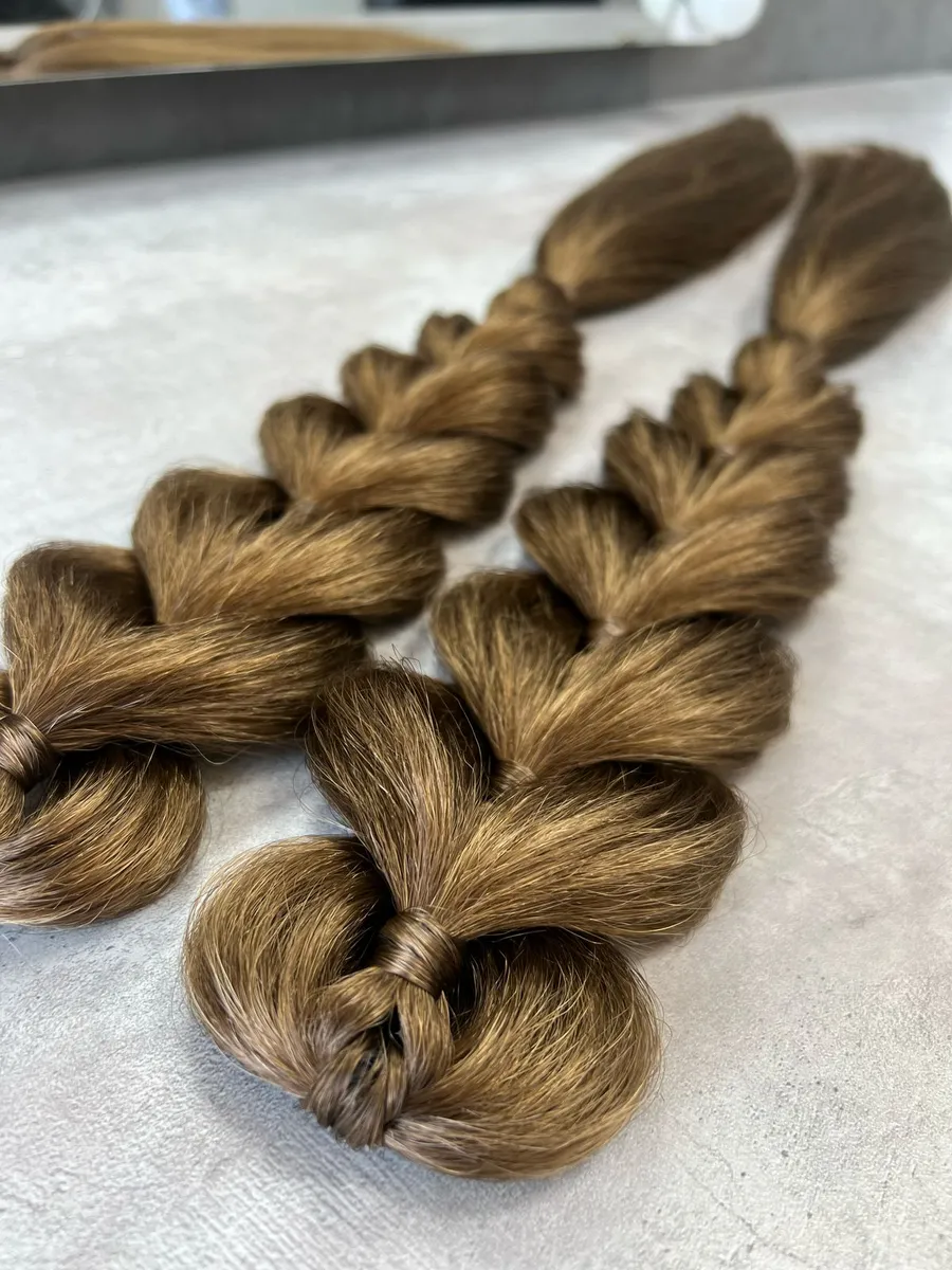 Французские косы с хвостами на заколках