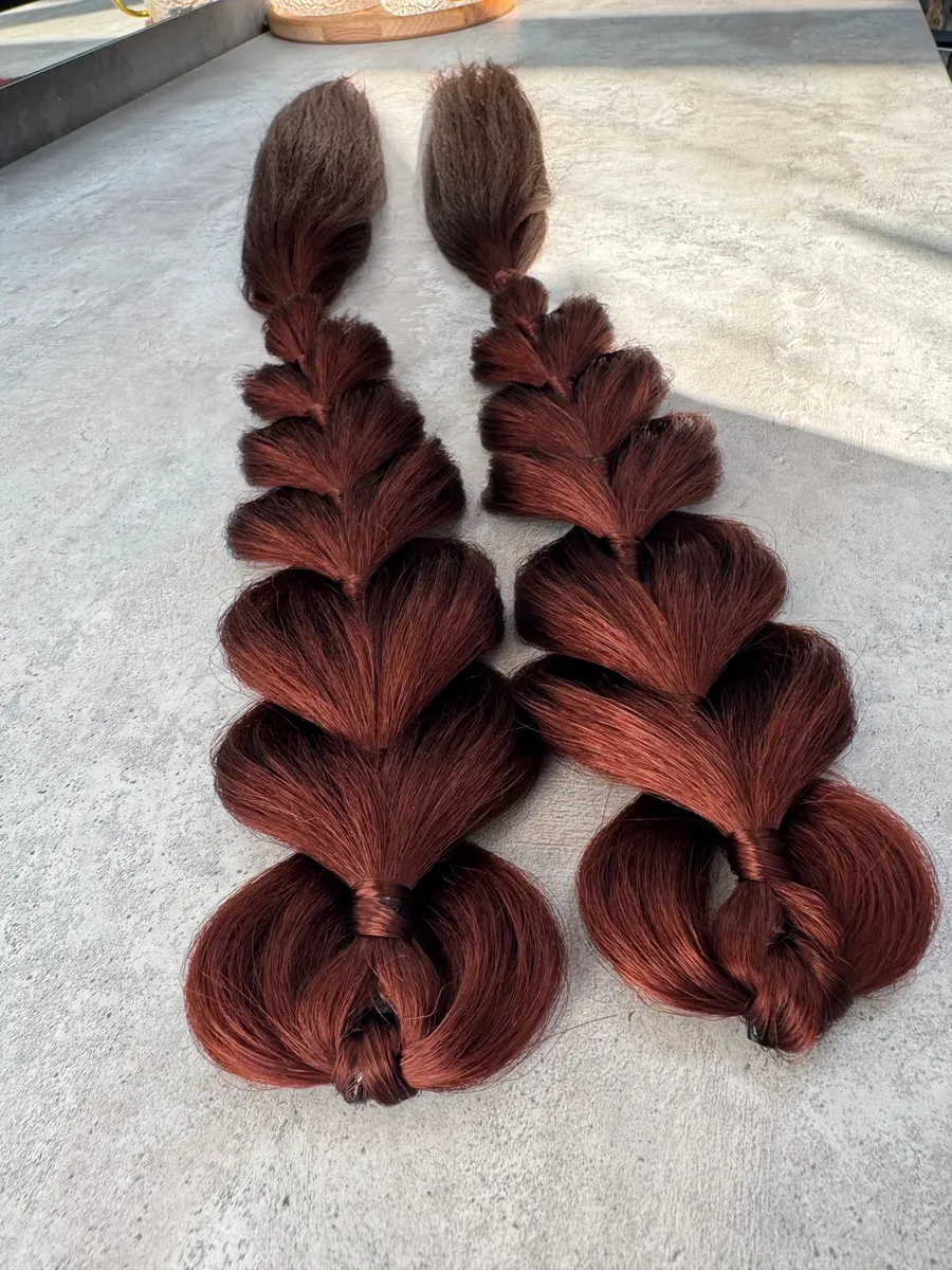 Французские косы с хвостами на заколках