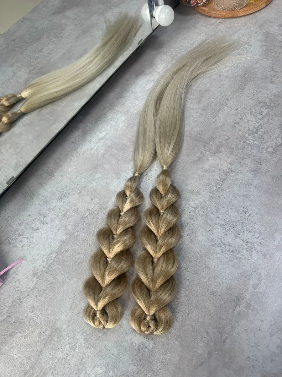 Французские косы с хвостами на заколках