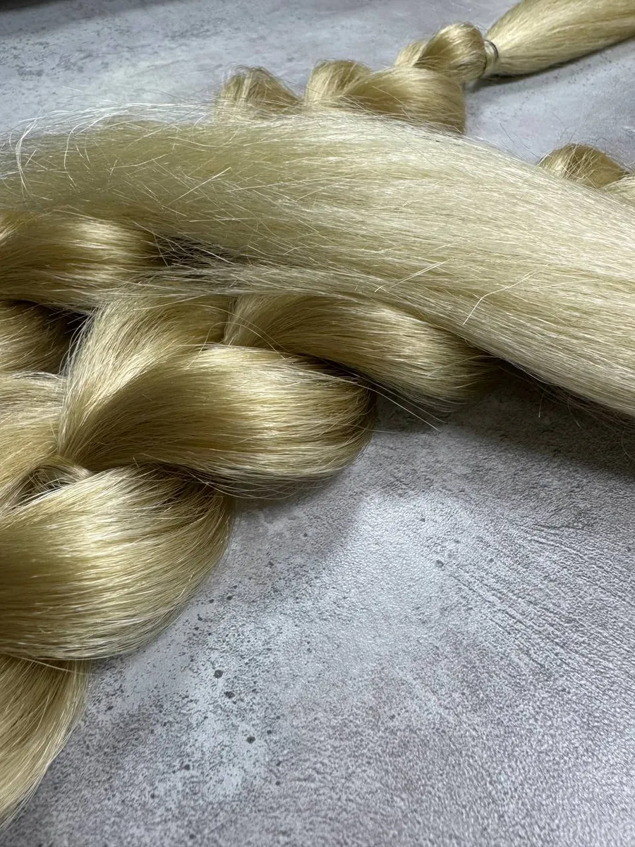 Французские косы с хвостами на заколках