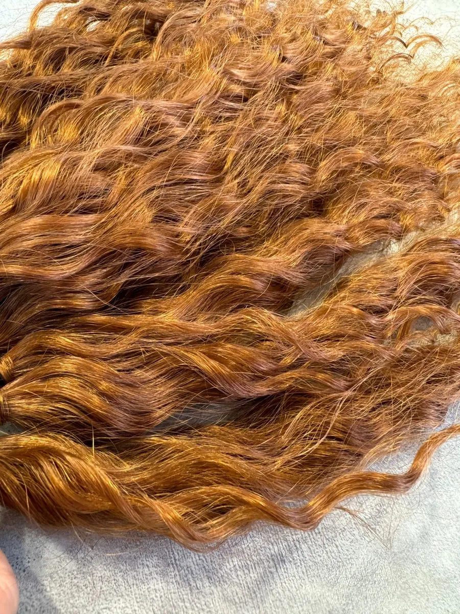 Кудрявый хвост на резинке