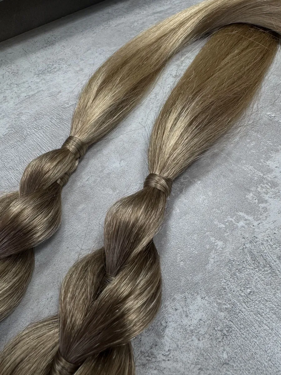 Французские косы с хвостами на заколках